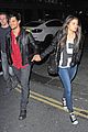 taylor lautner marie avgeropoulos matching jackets london 11
